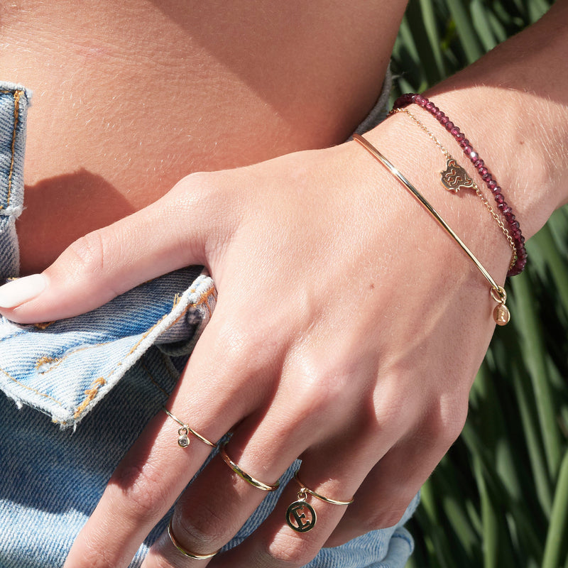 "RTS" Garnet Bracelet in Yellow Gold