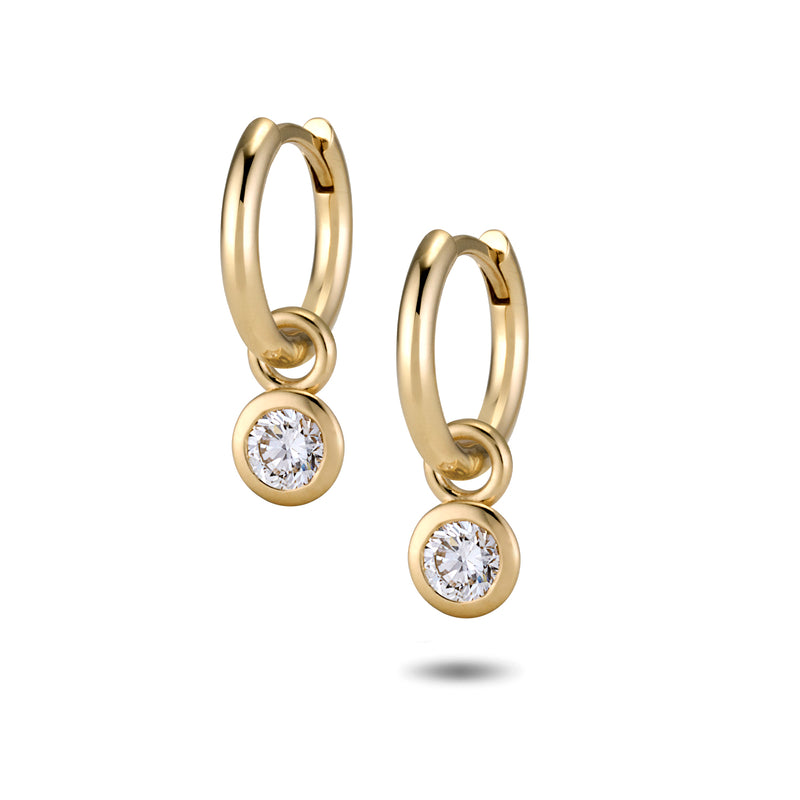 The TREASURE Diamond Headlamp Huggie Hoops in Yellow Gold