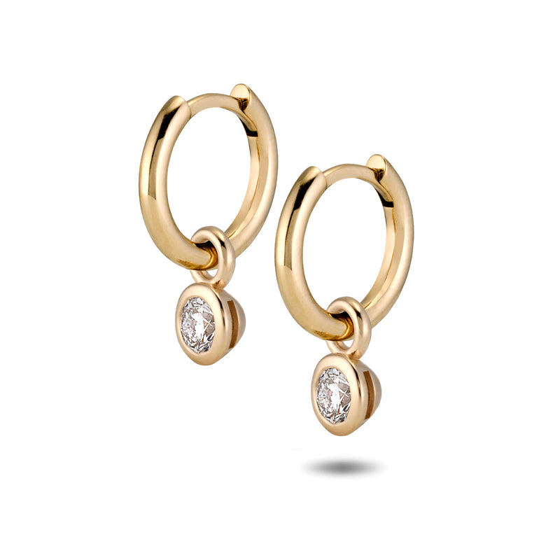 The TREASURE Diamond Headlamp Huggie Hoops in Yellow Gold