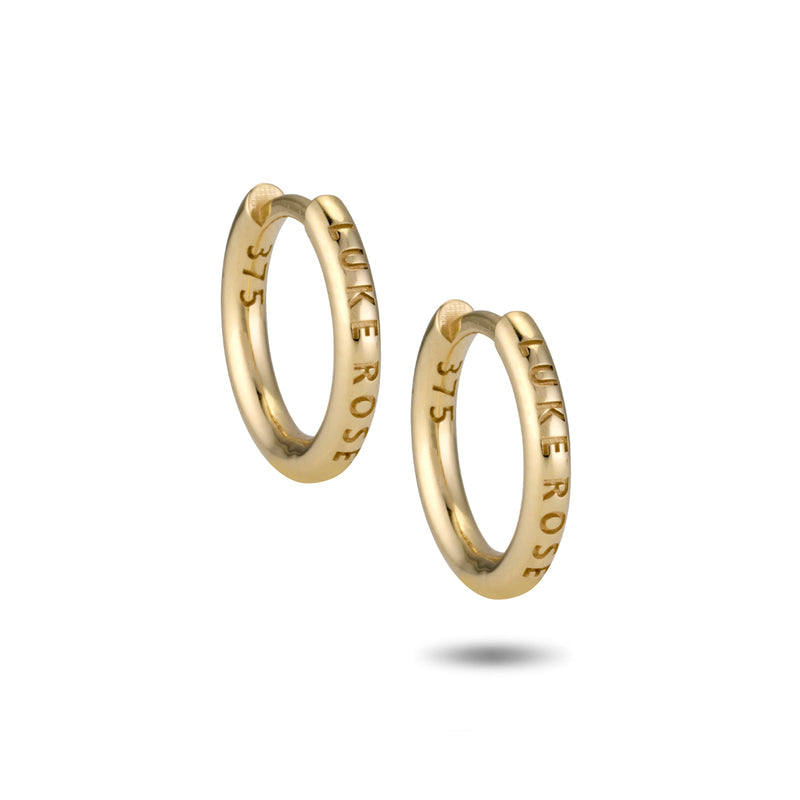The Etruscan Black Drape Huggie Hoops in Yellow Gold