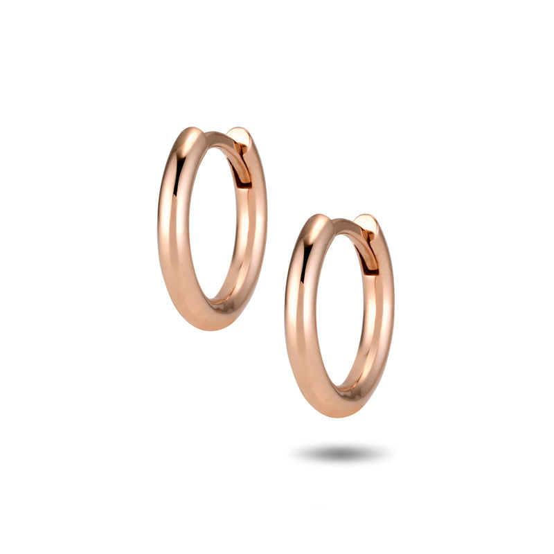 The TREASURE Huggie Hoops in Rose Gold