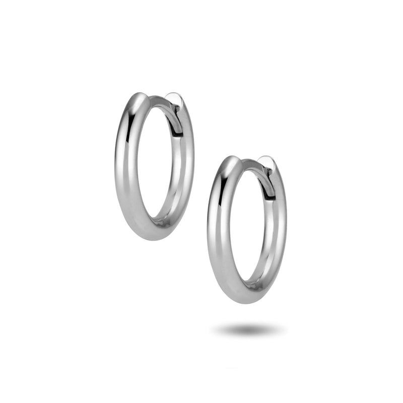 The TREASURE Huggie Hoops in White Gold